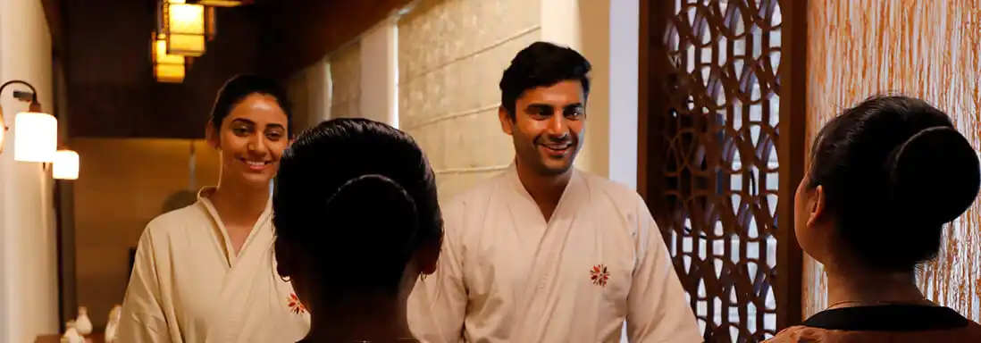 Relaxing spa room with massage table and ambient lighting