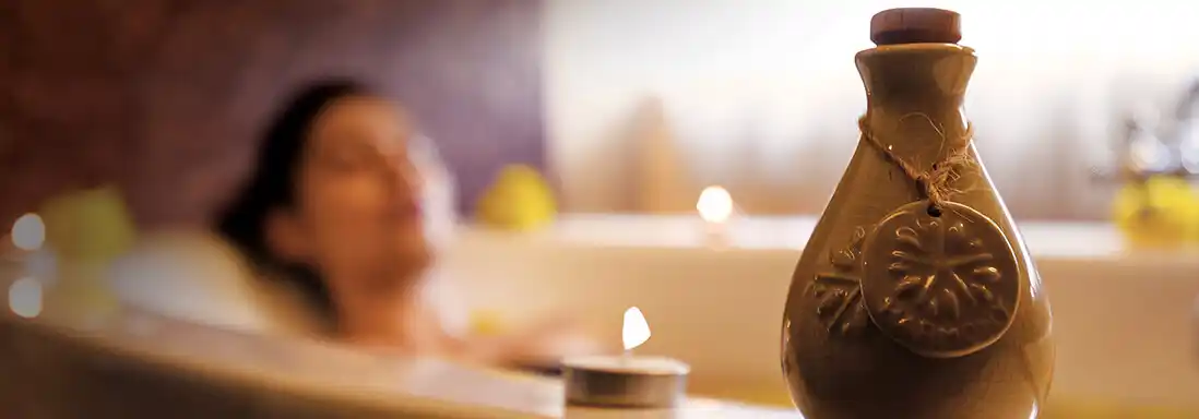 Relaxing spa room with massage table and ambient lighting